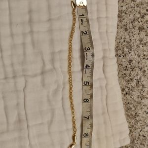 Golden bracelet, pretty link.